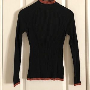 Black and brown detailed turtle neck top